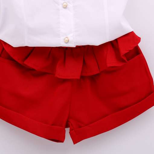 Komplekt valge särgi ja punaste pükstega